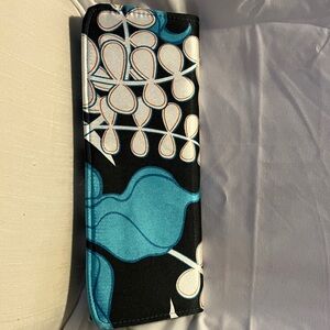 New. Soft n cushy printed satin clutch bag. Near perfect condition ( tiny tiny